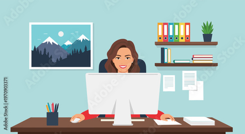 Professional woman smiling while working at her tidy office desk featuring a computer, shelves with books, and a mountain landscape picture.