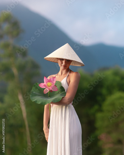Woman in White Dress Holding Lotus Flower in Vietnam Countryside