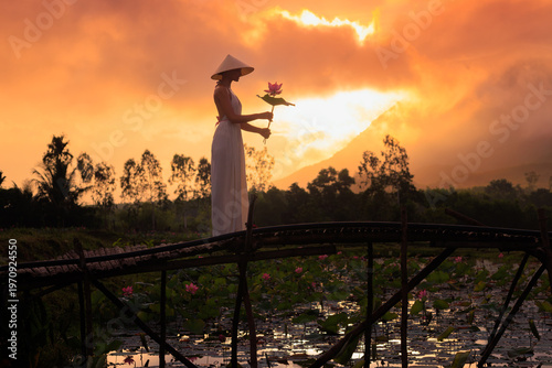 Vietnamese Woman Holding Lotus Flower at Tra Ly Lotus Pond Vietnam