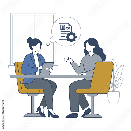 Two women sitting at a desk discussing a cv