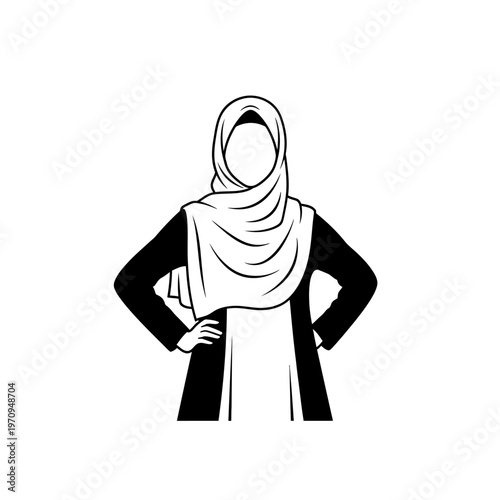 Woman wearing a hijab confidently standing.