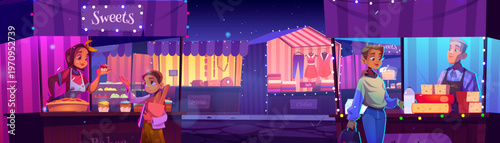 People visit night fair with outdoor wooden stalls