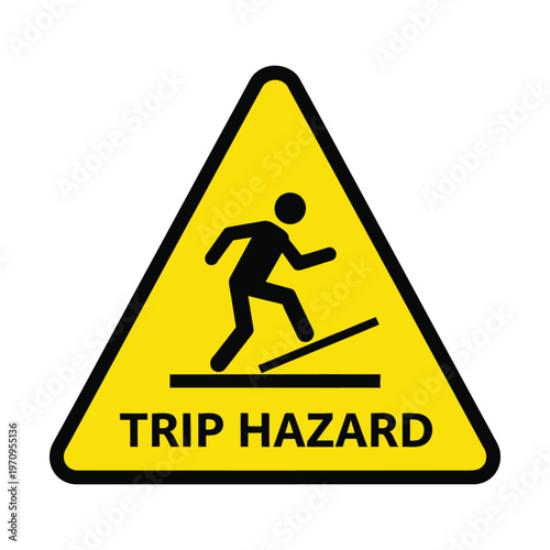 Yellow triangular warning sign with black pictogram of a person tripping over an obstacle and 'TRIP HAZARD' text.