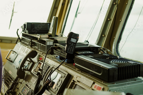 naval ship operation desk with control panels and navigation equipment onboard turkish vessel