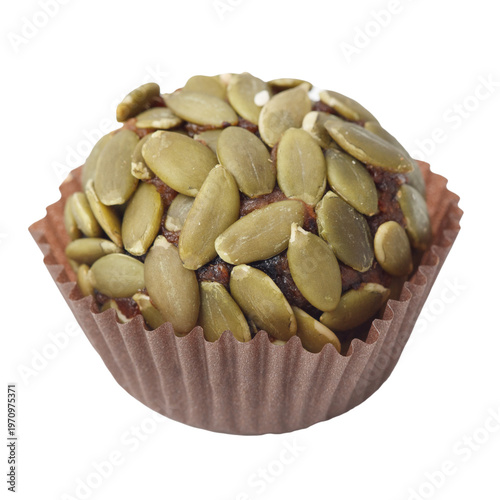 Delicious muffin crowned with roasted pumpkin seeds