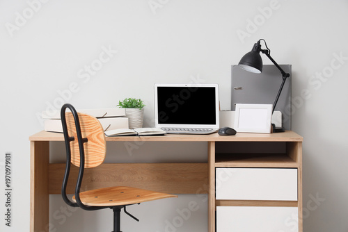 Workplace with blank laptop...