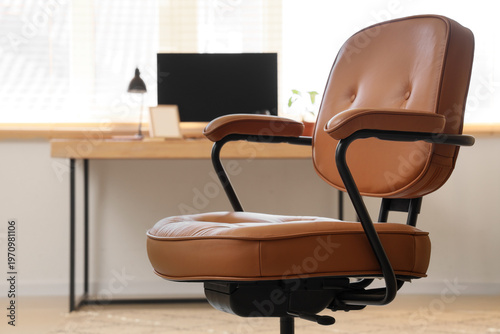 Comfortable brown chair in ...