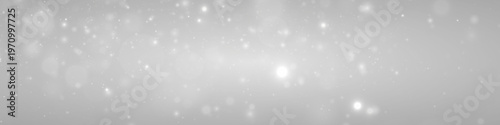 White glitter dust in glowing light, sparkle, shimmer, twinkle bokeh. Particle stardust highlights flare. Festive magical sparks with snow, snowflakes, glare, lens flare, PNG winter illustration.