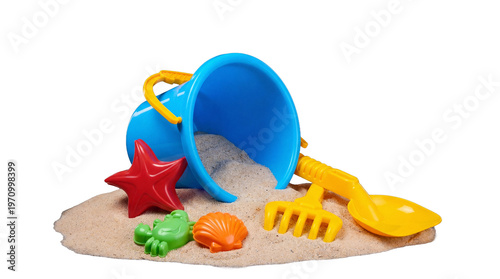 Foto Brightly colored children's beach toys on a small pile of sand, isolated on transparent background
