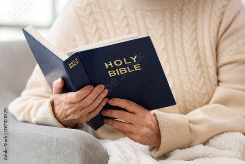 Christian senior woman read...