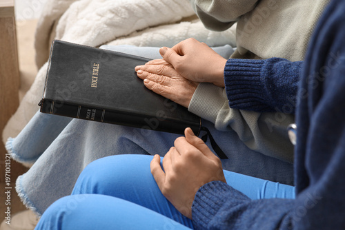 Christian senior woman and ...
