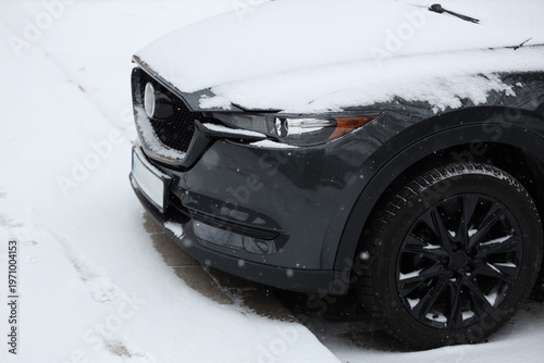 Modern black car covered wi...