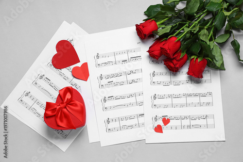Music sheets with rose flow...