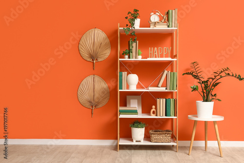 Bookshelf with books, decor...