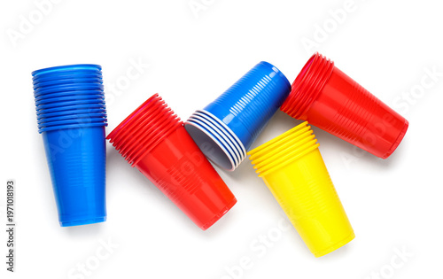 Foto Different plastic cups on white background