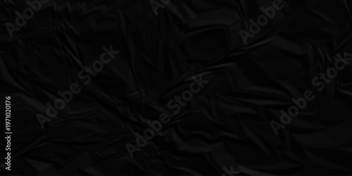 Black crumpled paper texture. Black wrinkled paper texture. Black crumpled and top view textures can be used for background of text or any contents.