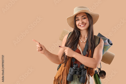 Female guide pointing at so...