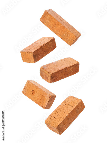 Foto Multiple individual red clay bricks with a rustic texture, dynamically arranged and floating in a creative composition