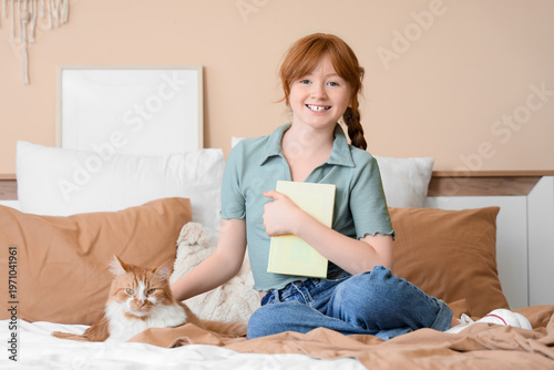 Teenage redhead girl with b...