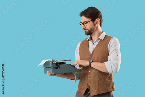 Young male writer with vint...