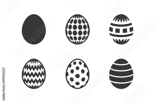 A set of six black and white Easter eggs with various patterns