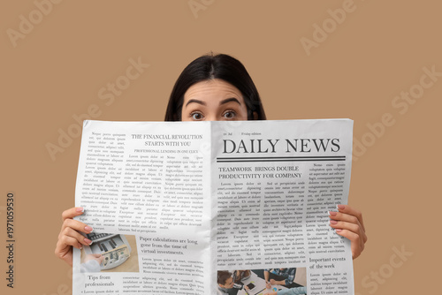 Shocked young woman reading...