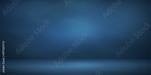 A dark blue textured wall backdrop features a metallic grunge pattern and a central spotlight reflecting off an empty stainless steel surface