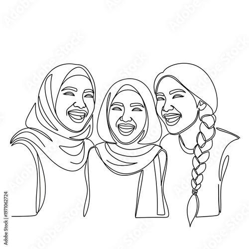 Three women wearing headscarves smiling.