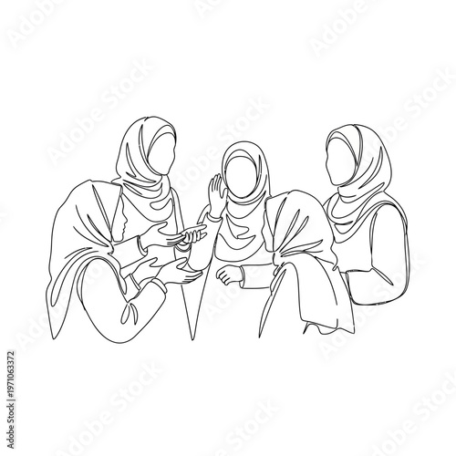 Women wearing headscarves sitting together.