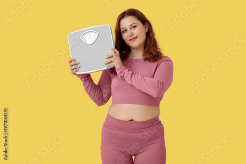 Overweight young happy woma...