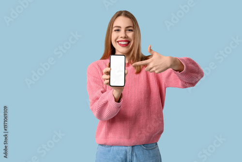 Young woman pointing at mob...