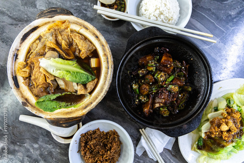 фотографія Traditional Penang Bak Kut Teh and Claypot Dishes Overhead Flatlay