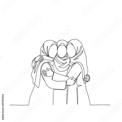 Three women in headscarves hugging.