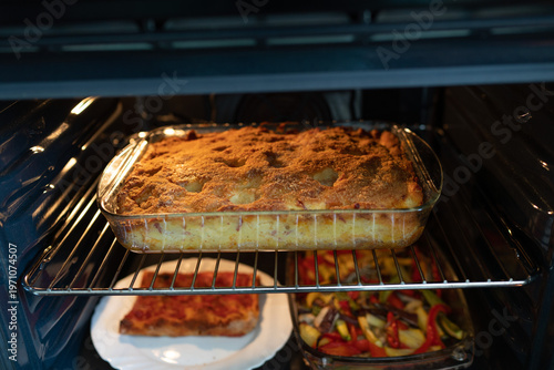 A rustic Neapolitan Potato Gateau fresh from the oven. A savory Italian dish made with mashed potatoes, melted mozzarella, Italian cured meats, and eggs, baked until golden with a crispy breadcrumb to