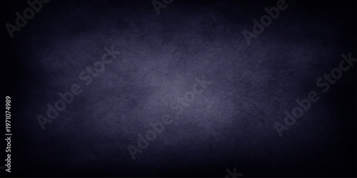 Dark blue grunge textured background with rough surface and empty copy space for design