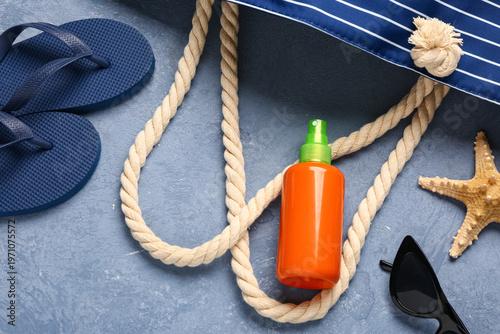 Bottle of sunscreen cream w...