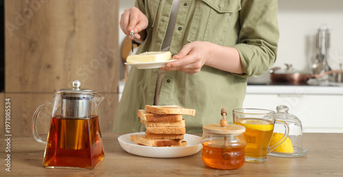 Woman with tasty butter, to...