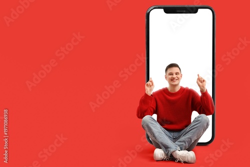 Happy man and big smartphon...