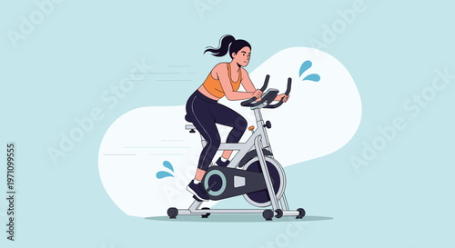 Energetic woman exercising on a stationary indoor cycling bike for a cardio workout to improve health and physical fitness.