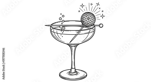 A cocktail glass contains a sparkling drink with a disco ball garnish.