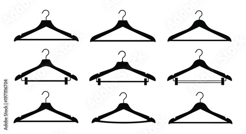 Black silhouette graphic illustration of various clothing hangers in different designs and styles