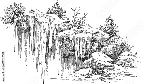 Winter rocky cliff edge with icicles hanging and snow covered pine trees in cold season landscape