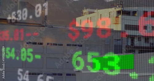Market ticker updating over facade, driven by real-time feed showing market movement with currency