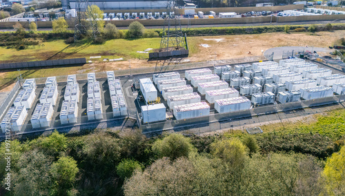 Aerial View of an industrial Battery Energy Storage System with Container Units at Power Substation