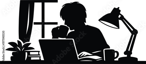 Freelance Designer Silhouette Working on Laptop at Night with Desk Lamp