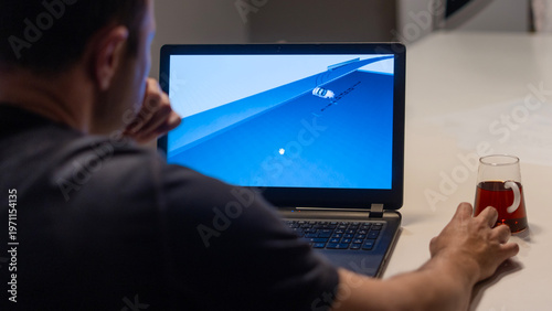 mechanic man at auto service using check up device