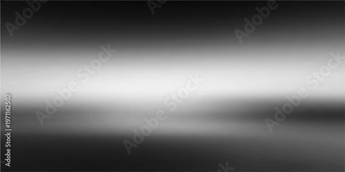 A shiny brushed silver metal texture background with a gray stainless steel gradient pattern on an industrial aluminum plate surface design