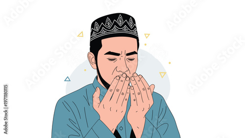 Muslim man wearing a traditional kufi cap and blue shirt praying with his hands raised in a gesture of supplication.