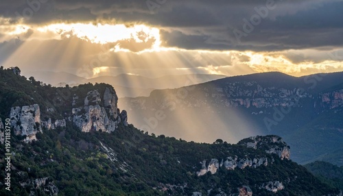 Dramatic sunlight over mountain peaks