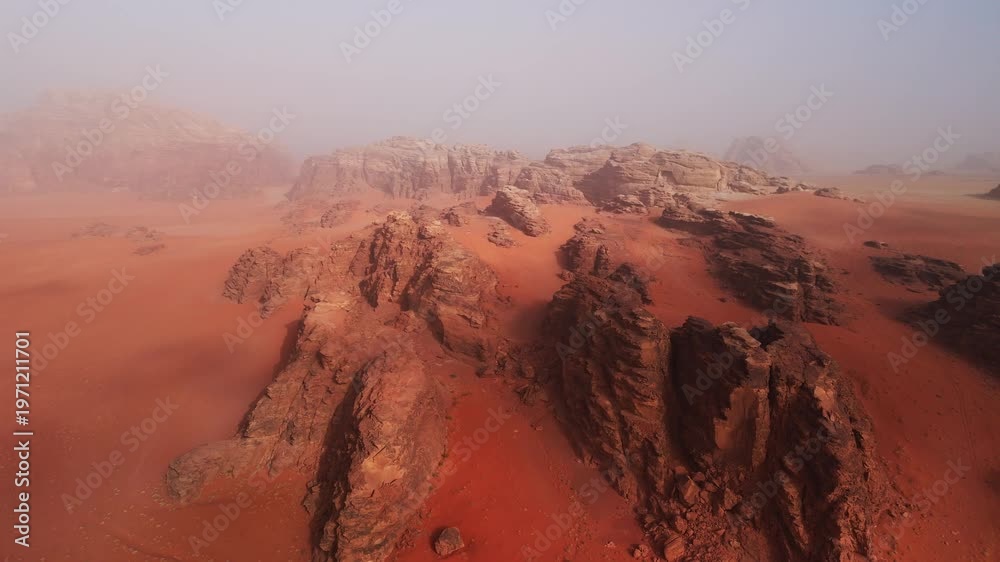 custom made wallpaper toronto digitalWide drone over big red rocky mountains in mist in wadi rum desert in jordan